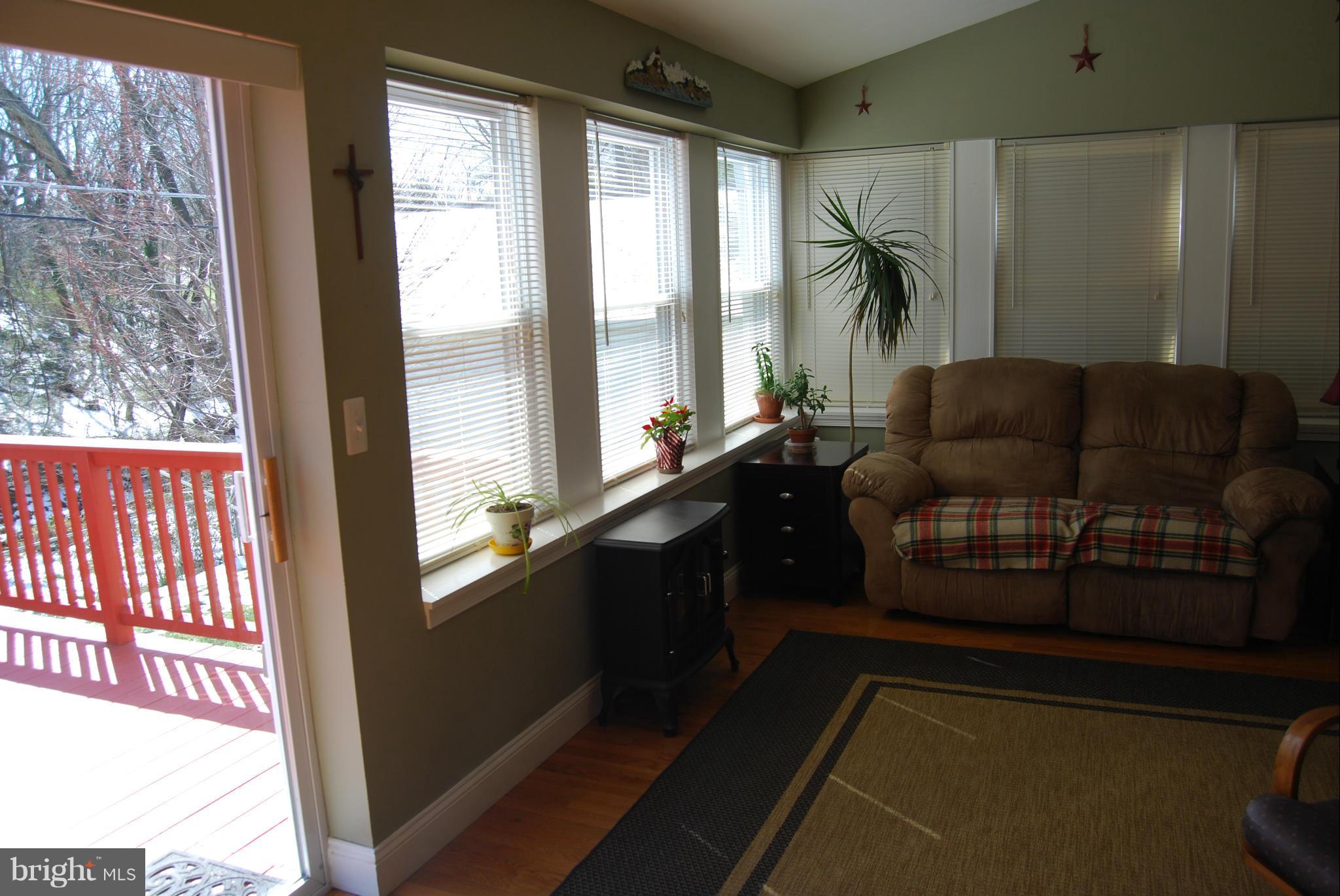 8127 Woodhaven Road Baltimore, MD 21237 - Photo 15 of 29 Sunroom
