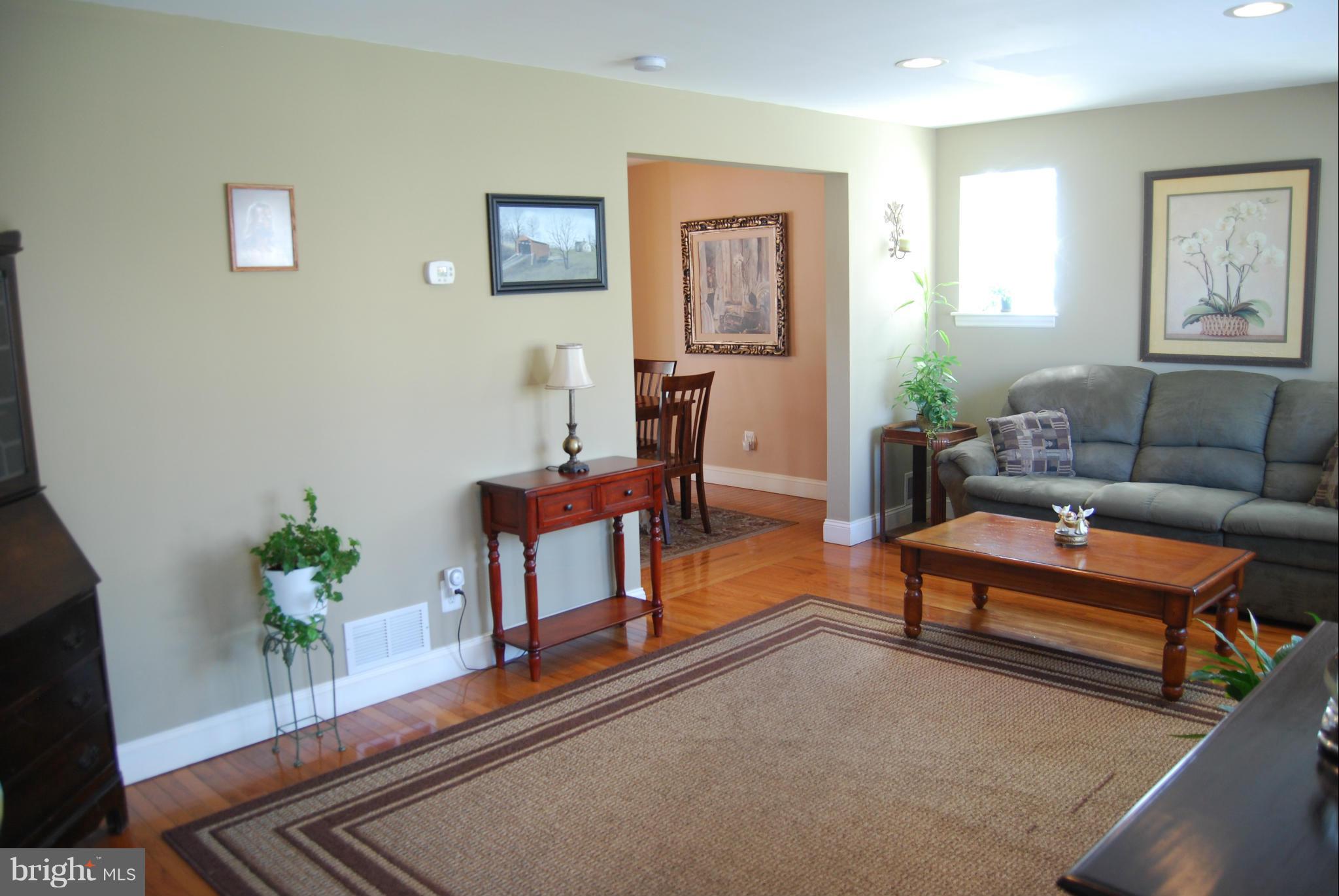 8127 Woodhaven Road Baltimore, MD 21237 - Photo 5 of 29 Living Room w/beautiful wood floors!