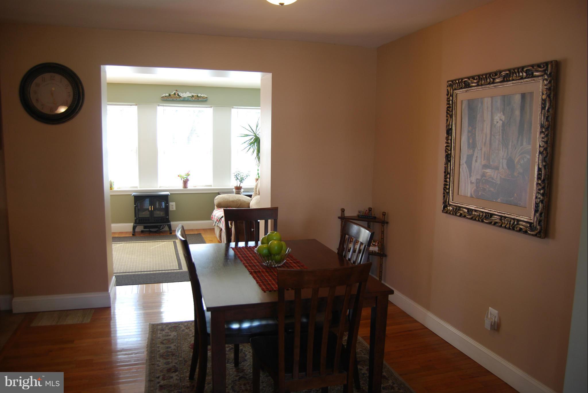 8127 Woodhaven Road Baltimore, MD 21237 - Photo 8 of 29 Dining Room off kitchen w/wood floors