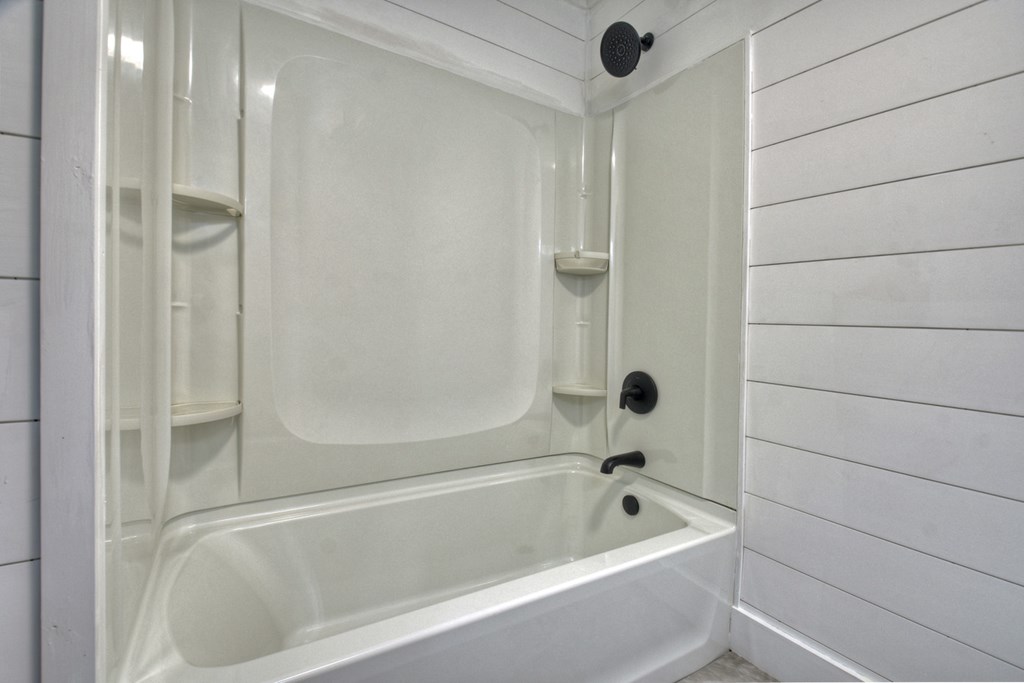 975 Goss Road Epworth, GA 30541 - Photo 32 of 59 a bathroom with a tub