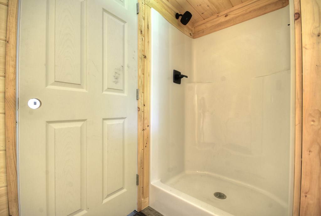 975 Goss Road Epworth, GA 30541 - Photo 42 of 59 a bathroom with a shower