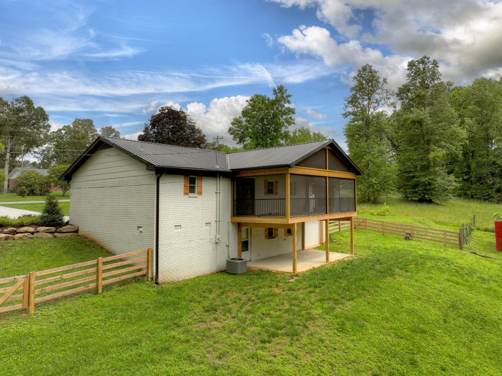 975 Goss Road Epworth, GA 30541 - Photo 45 of 59 a view of a house with a backyard