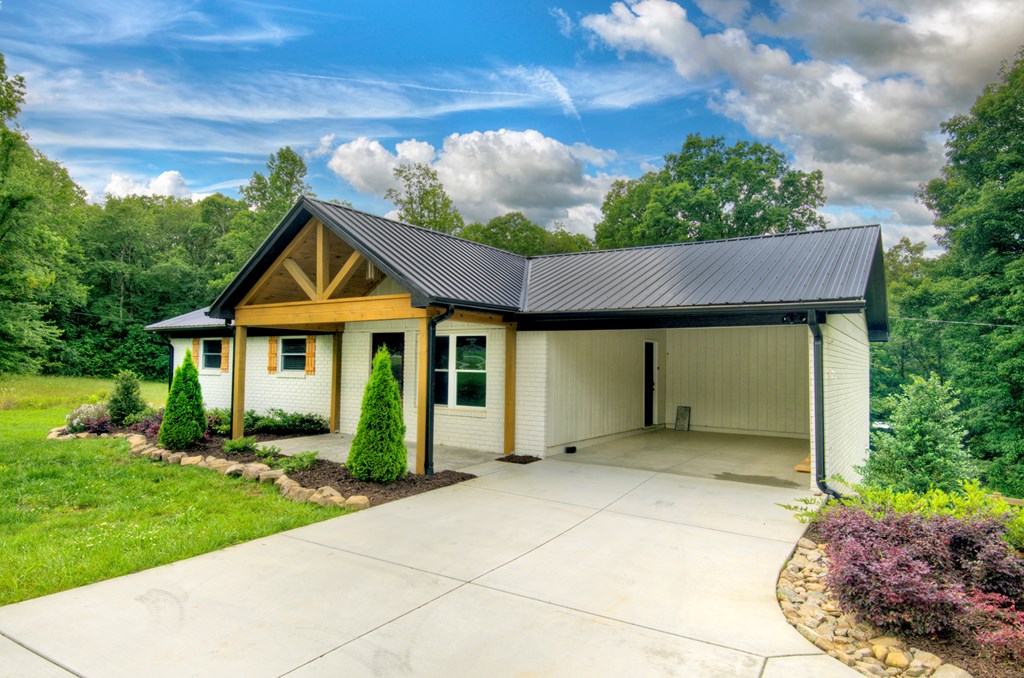 975 Goss Road Epworth, GA 30541 - Photo 59 of 59 a front view of a house with garden