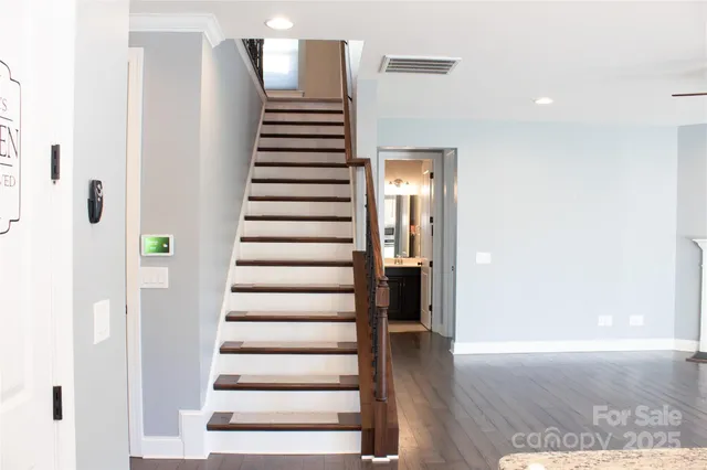 a view of entryway with wooden floor