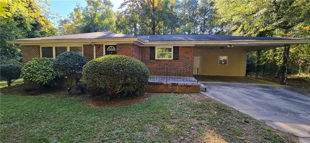 front view of a house with a yard