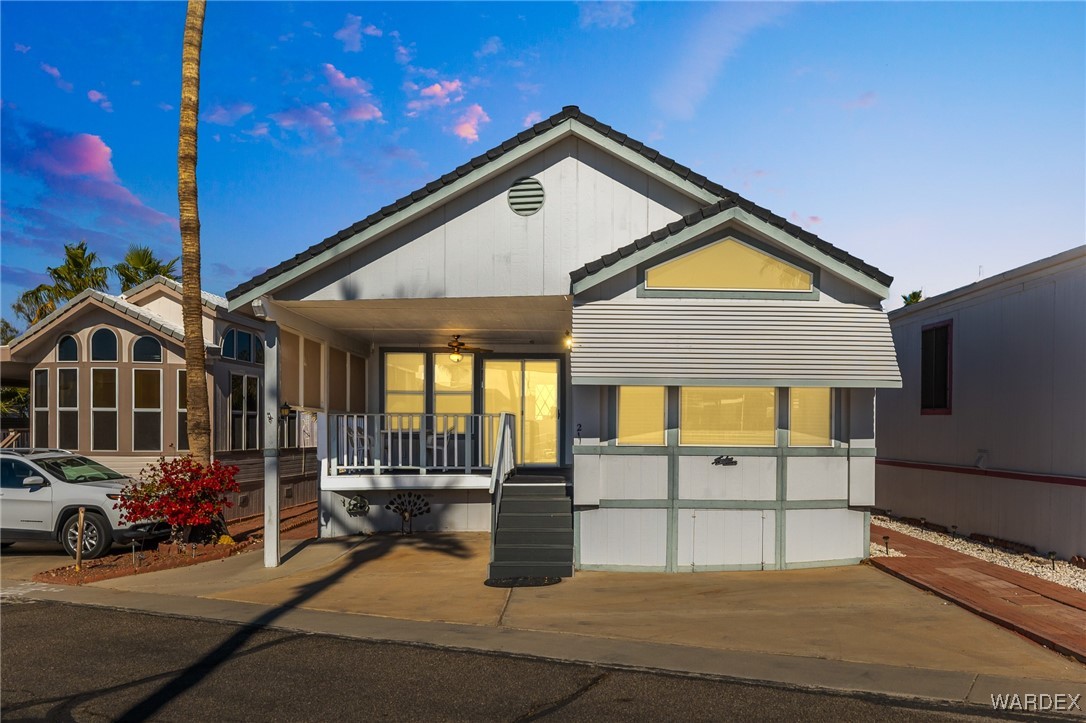 2000 Ramar Road, Unit 211 Bullhead City, AZ 86442 - Photo 1 of 57 Cute curb appeal with a welcoming covered front patio.