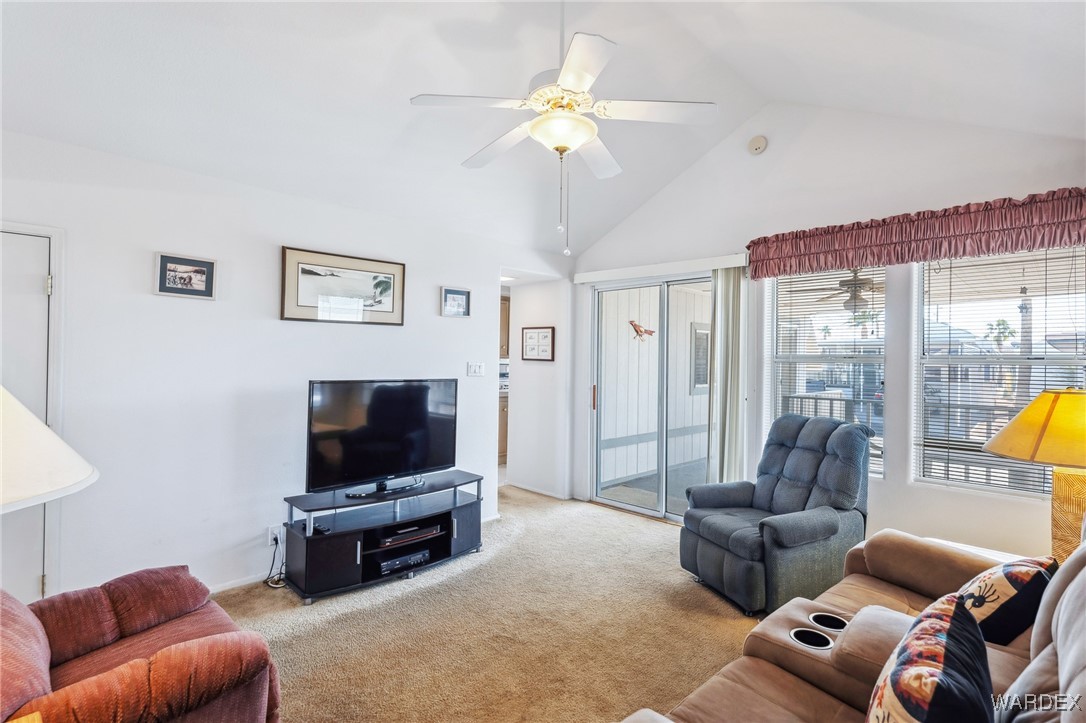 2000 Ramar Road, Unit 211 Bullhead City, AZ 86442 - Photo 22 of 57 Bright family room with sliding doors to the outside.