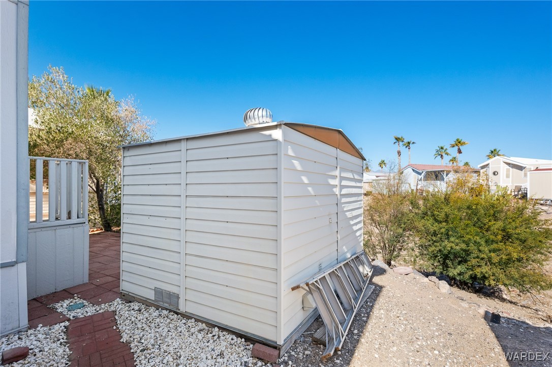 2000 Ramar Road, Unit 211 Bullhead City, AZ 86442 - Photo 33 of 57 Storage shed offering extra space for tools or gear.