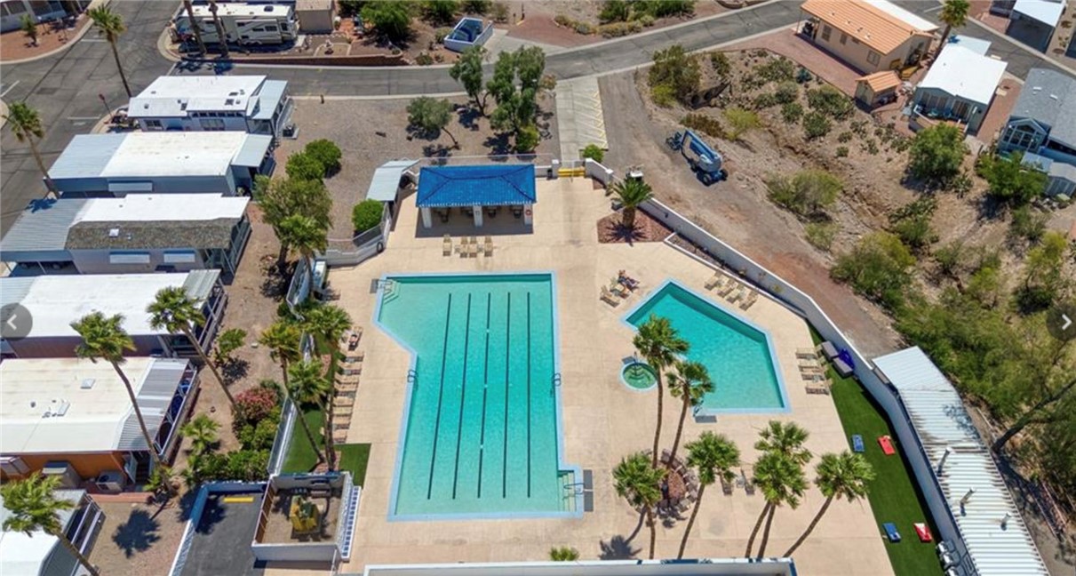 2000 Ramar Road, Unit 211 Bullhead City, AZ 86442 - Photo 40 of 57 Aerial pool view showing multiple pools and amenities.