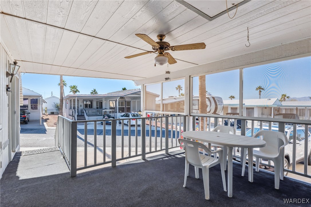 2000 Ramar Road, Unit 211 Bullhead City, AZ 86442 - Photo 4 of 57 Nice wide view showing driveway parking and neighborhood setting.