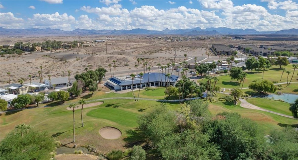 2000 Ramar Road, Unit 211 Bullhead City, AZ 86442 - Photo 54 of 57 Golf course aerial showcasing lush greens and open views.