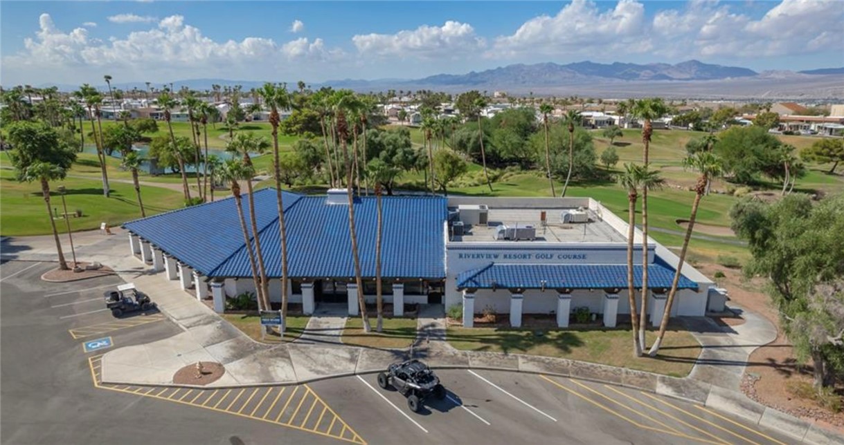 2000 Ramar Road, Unit 211 Bullhead City, AZ 86442 - Photo 55 of 57 Riverview Golf Pro Shop with parking and community amenities.