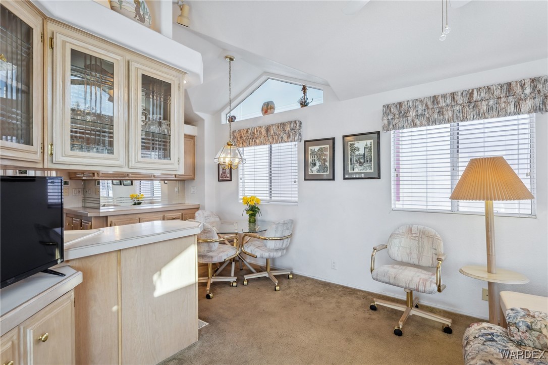 2000 Ramar Road, Unit 211 Bullhead City, AZ 86442 - Photo 8 of 57 Living space with built-ins and room to relax or entertain.