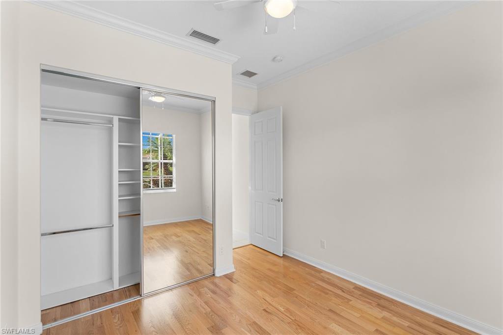 3128 Dominica Way Naples, FL 34119 - Photo 22 of 45 a view of an empty room and window