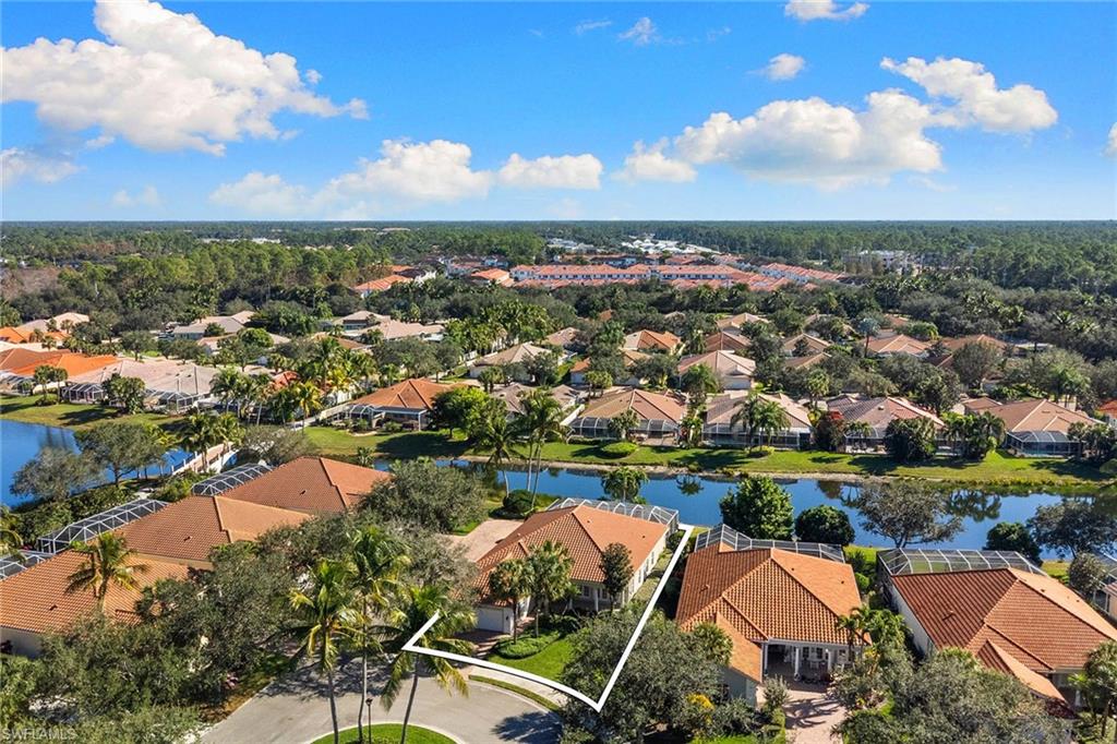 3128 Dominica Way Naples, FL 34119 - Photo 35 of 45 an aerial view of residential houses with outdoor space and river