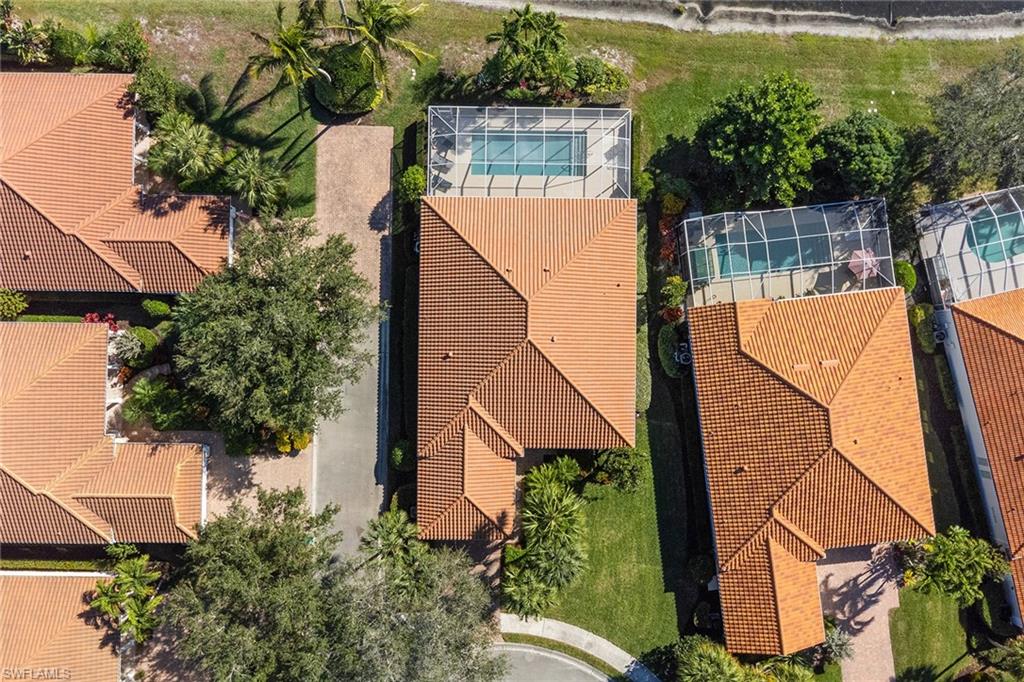 3128 Dominica Way Naples, FL 34119 - Photo 39 of 45 an aerial view of a house with a yard and potted plants