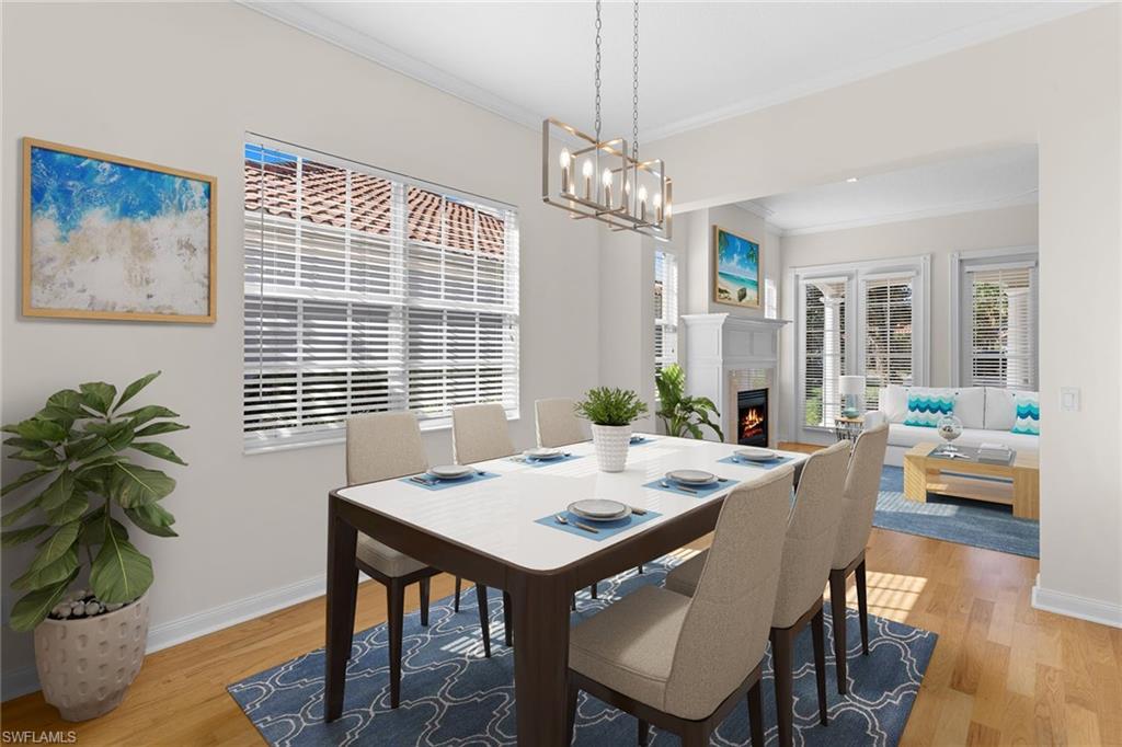 3128 Dominica Way Naples, FL 34119 - Photo 6 of 45 a view of a dining room with furniture window and wooden floor