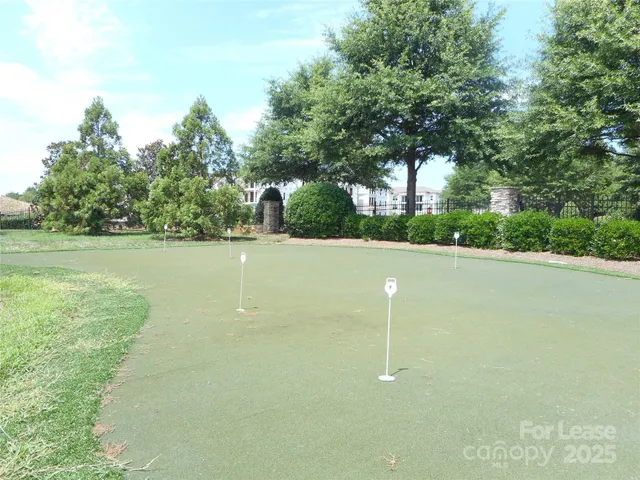 a view of a swimming pool and an outdoor space