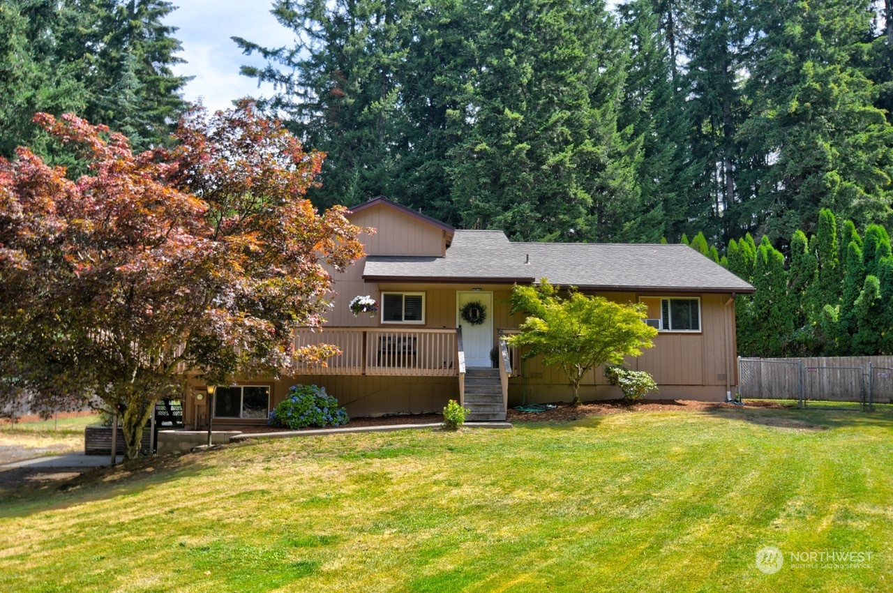 3110 Zenkner Valley Road Centralia, WA 98531 - Photo 1 of 40 a front view of house with yard and trees in the background