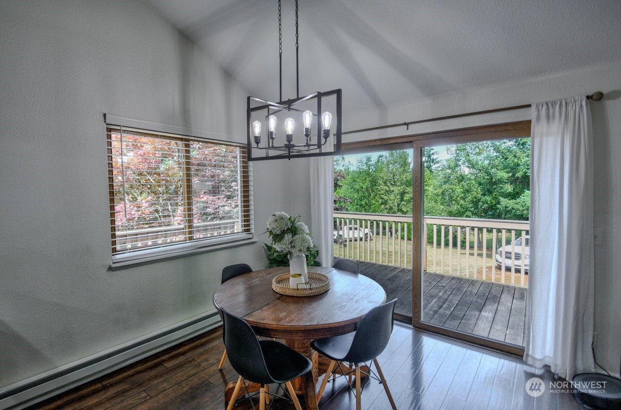 3110 Zenkner Valley Road Centralia, WA 98531 - Photo 14 of 40 a view of a dining room with furniture window and wooden floor