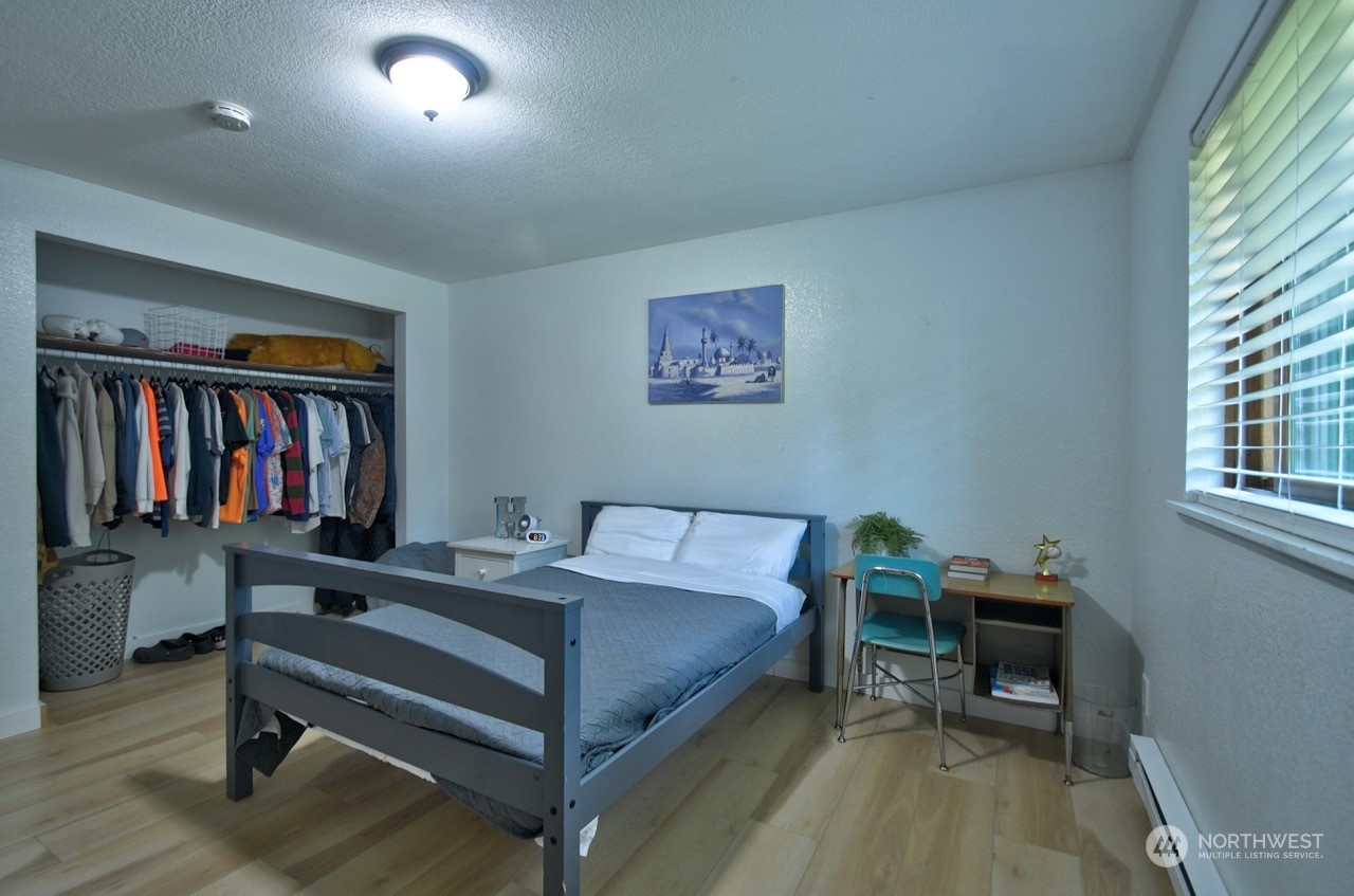 3110 Zenkner Valley Road Centralia, WA 98531 - Photo 16 of 40 a bedroom with furniture and a bed