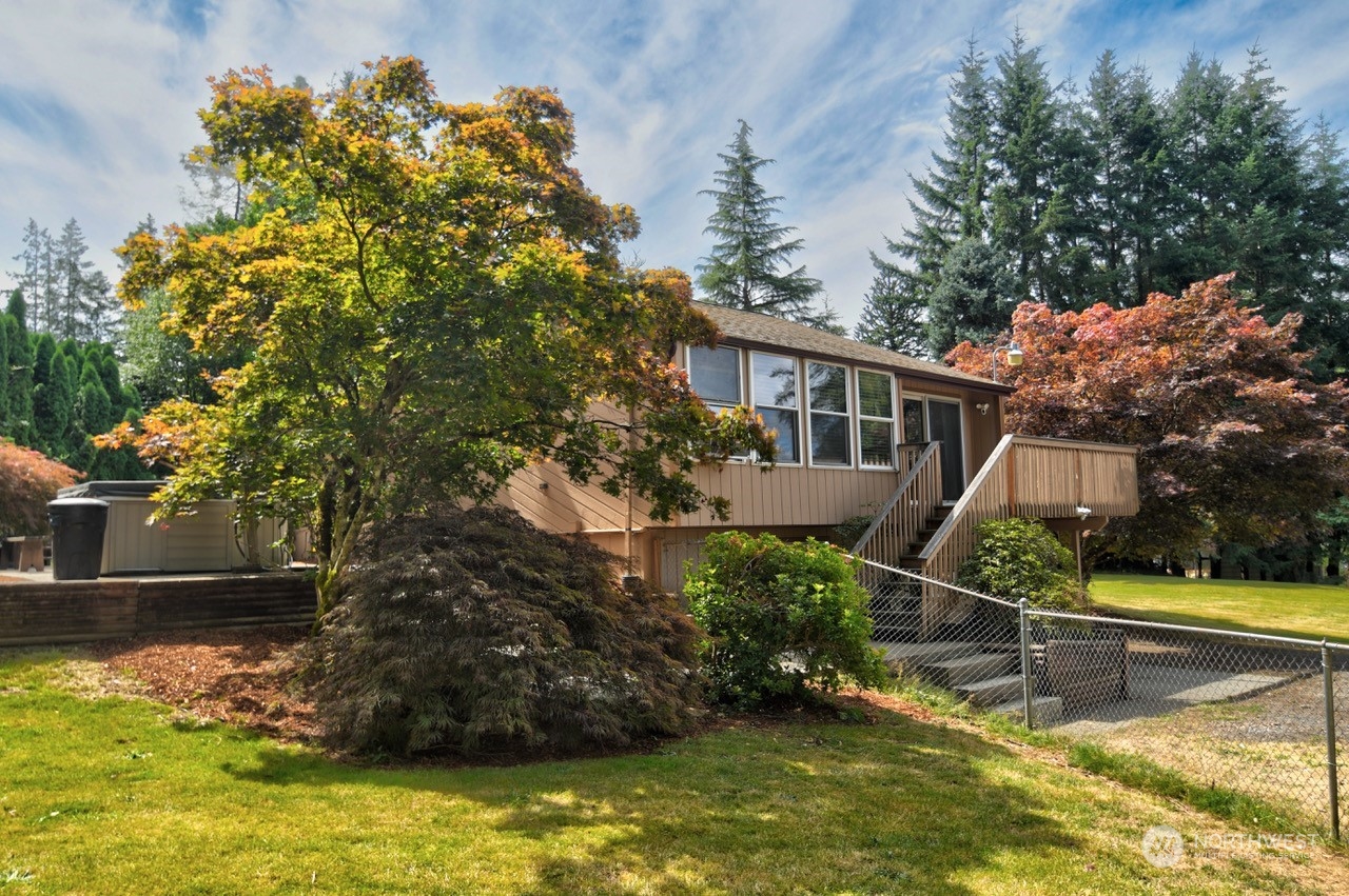 3110 Zenkner Valley Road Centralia, WA 98531 - Photo 37 of 40 a view of house with swimming pool and a yard with green space