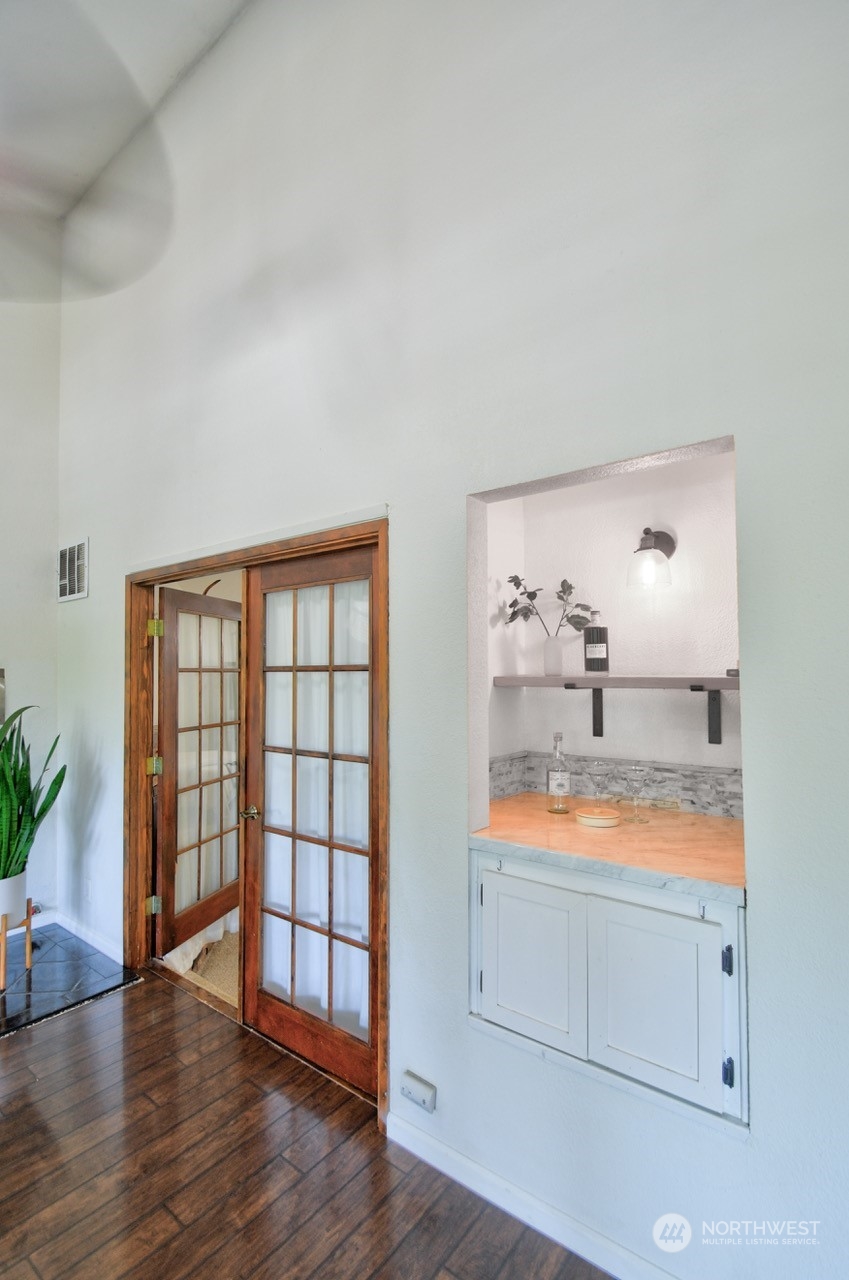3110 Zenkner Valley Road Centralia, WA 98531 - Photo 6 of 40 a view of an empty room with wooden floor and a window
