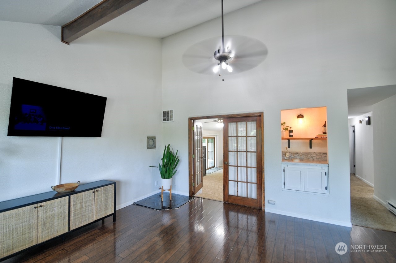 3110 Zenkner Valley Road Centralia, WA 98531 - Photo 9 of 40 a living room with furniture and a flat screen tv