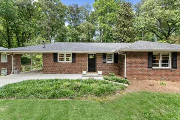 front view of a house with a yard