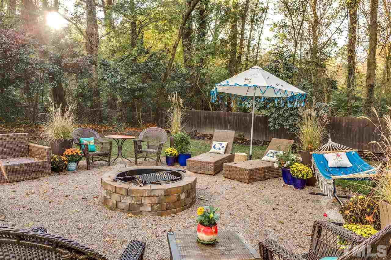 2715 Rothgeb Drive Raleigh, NC 27609 - Photo 22 of 25 PERFECT SPOT TO ENJOY THE SERENITY OF THE LOT. WOODED AREA BEHIND THE HOME IS A NATURAL AREA FOR THE CITY OF RALEIGH.