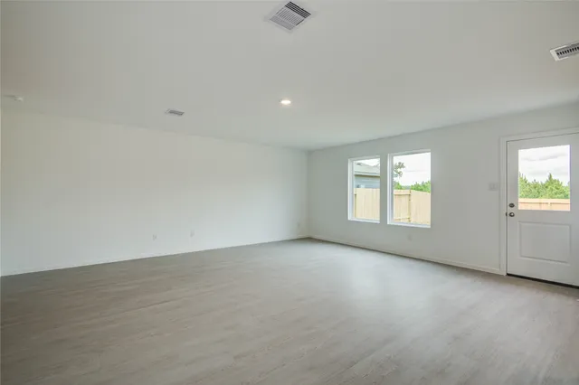 an empty room with windows