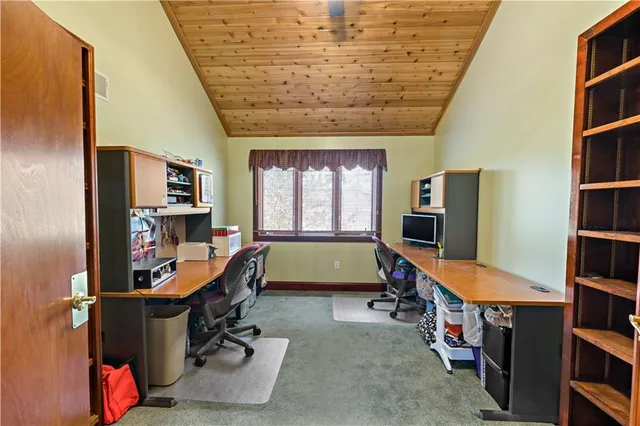 a room with furniture and gym equipment