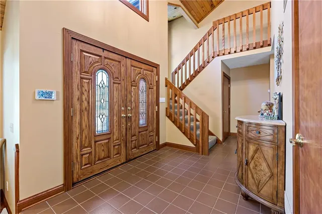 a view of an entryway with staircase