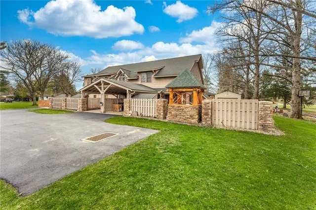 front view of a house with a yard