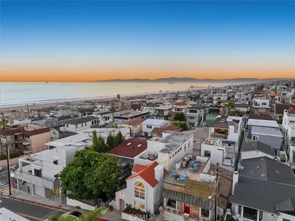 an aerial view of a city with lots of residential buildings