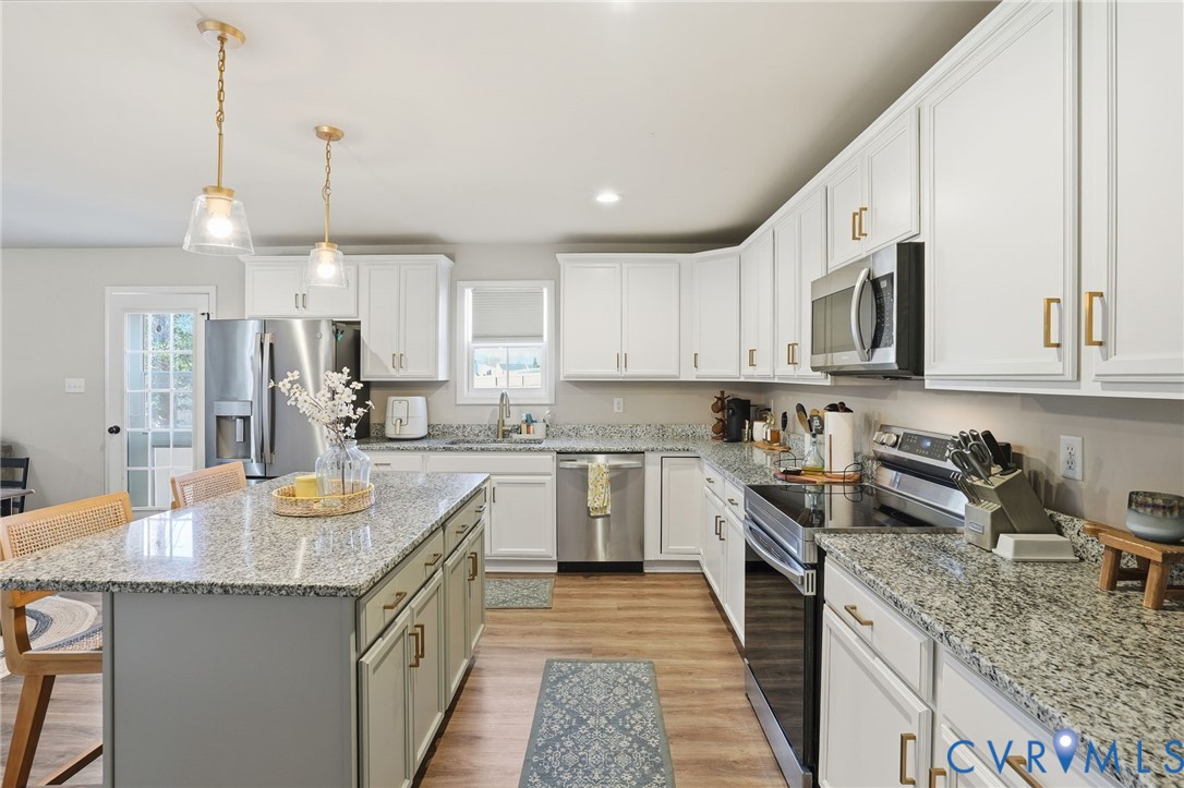 8494 Scouts Road Quinton, VA 23141 - Photo 15 of 27 Kitchen with a breakfast bar area, appliances with