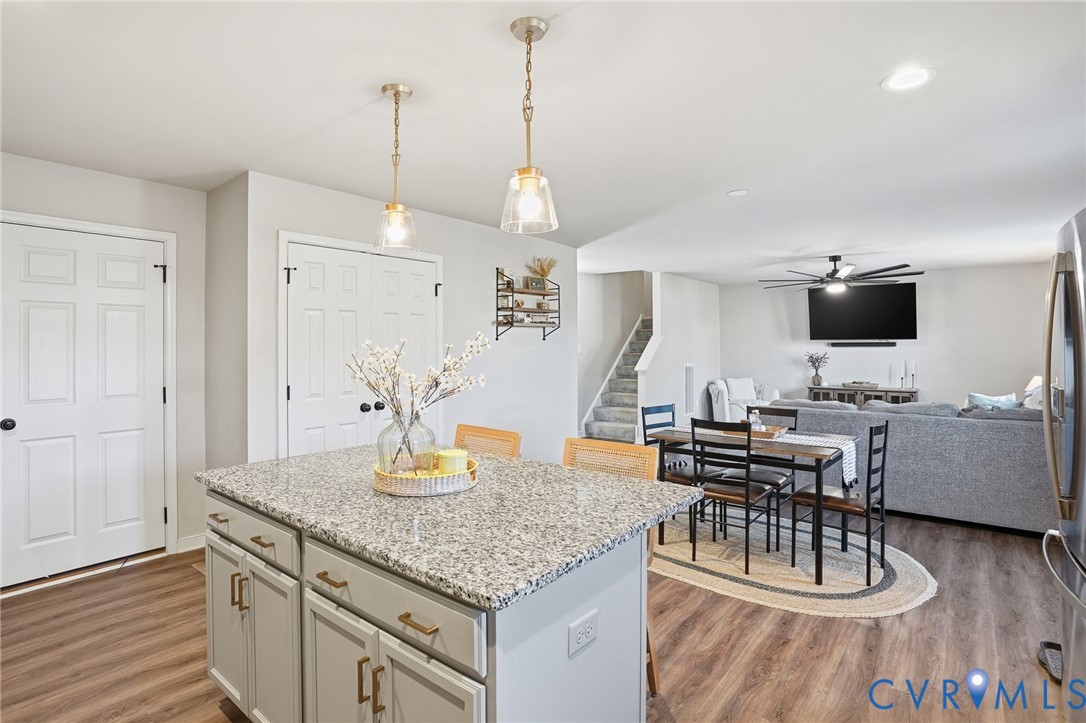 8494 Scouts Road Quinton, VA 23141 - Photo 16 of 27 Kitchen with pendant lighting, light stone counter
