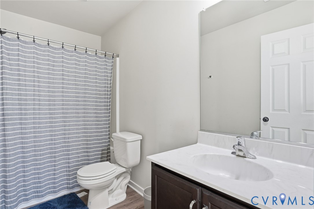 8494 Scouts Road Quinton, VA 23141 - Photo 22 of 27 Full bath featuring vanity, a shower with curtain,