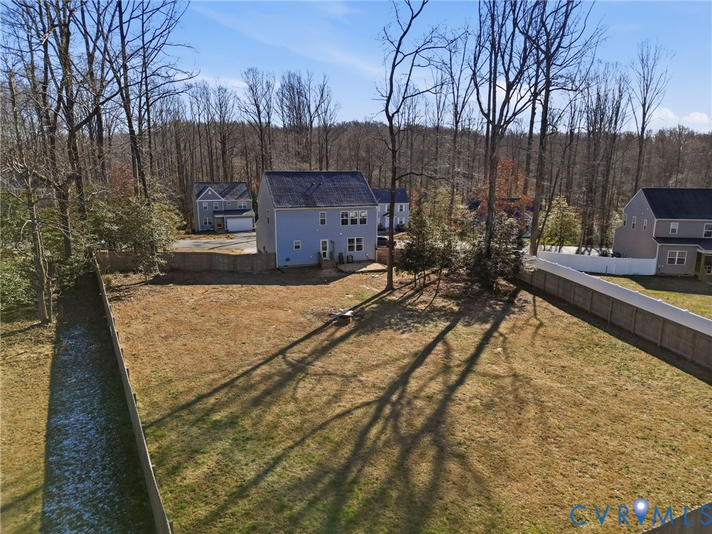 8494 Scouts Road Quinton, VA 23141 - Photo 4 of 27 Fenced yard with a forest view