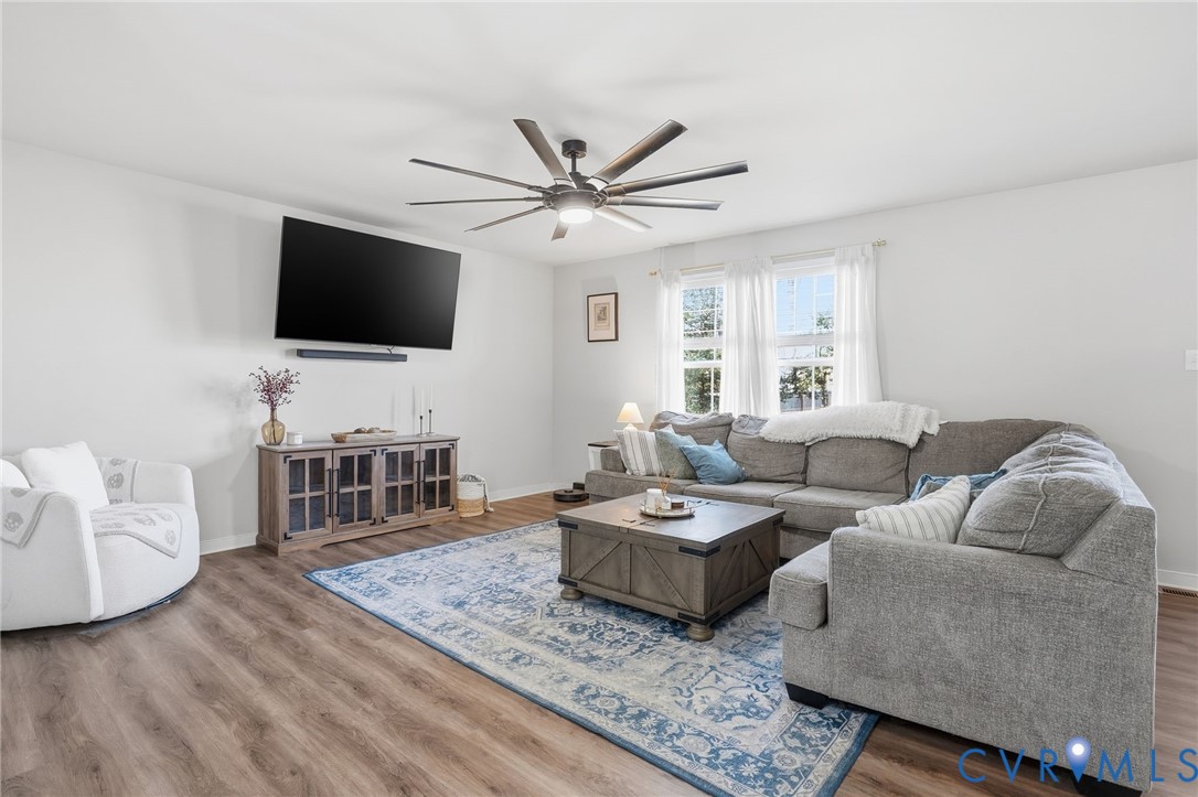 8494 Scouts Road Quinton, VA 23141 - Photo 10 of 27 Living room with wood finished floors and ceiling