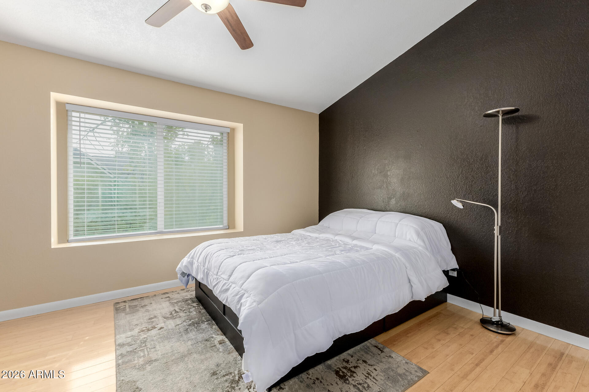 4843 East Corral Road, Unit 4 Phoenix, AZ 85044 - Photo 11 of 36 a bedroom with a bed and a window