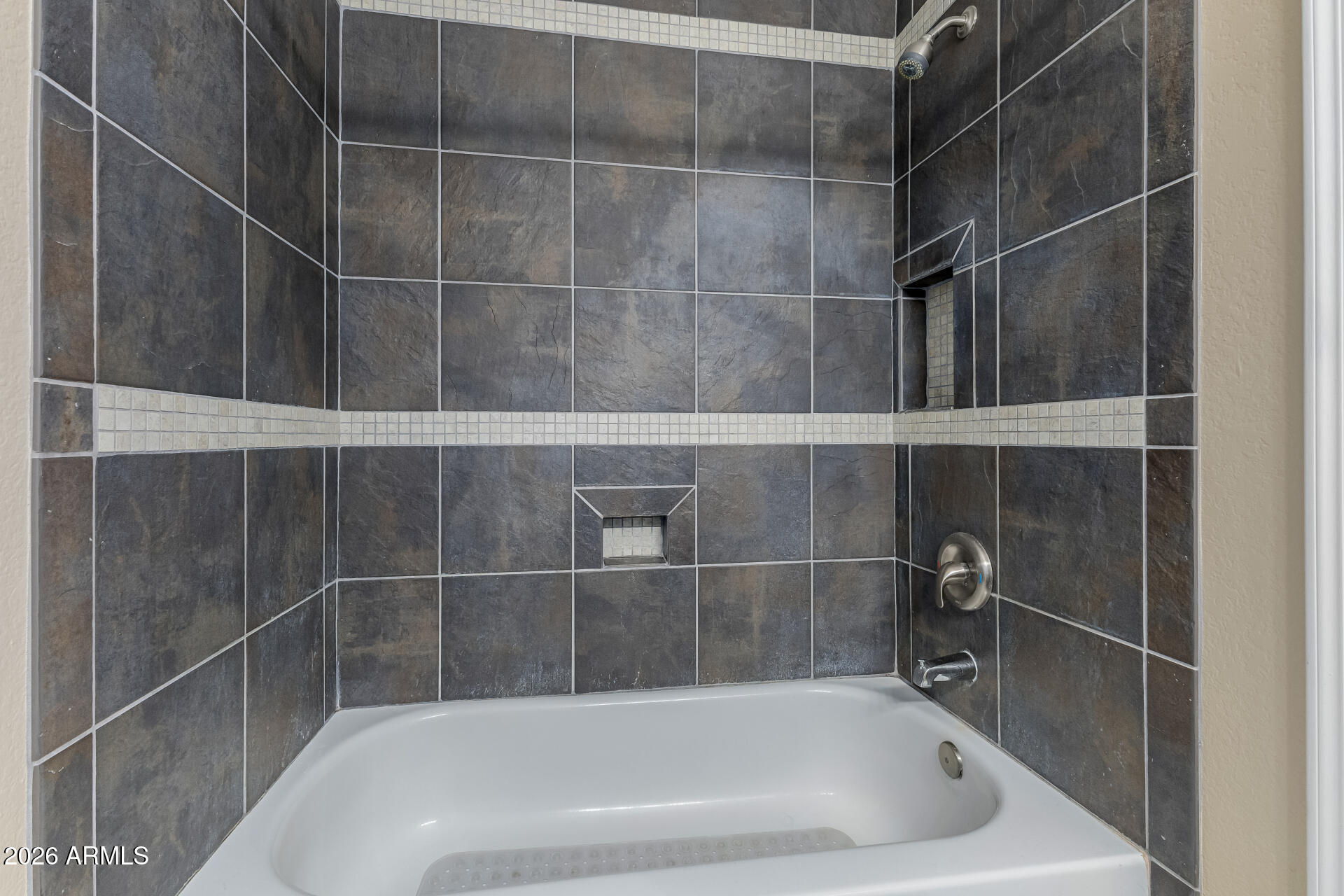 4843 East Corral Road, Unit 4 Phoenix, AZ 85044 - Photo 18 of 36 a bath tub sitting next to a shower