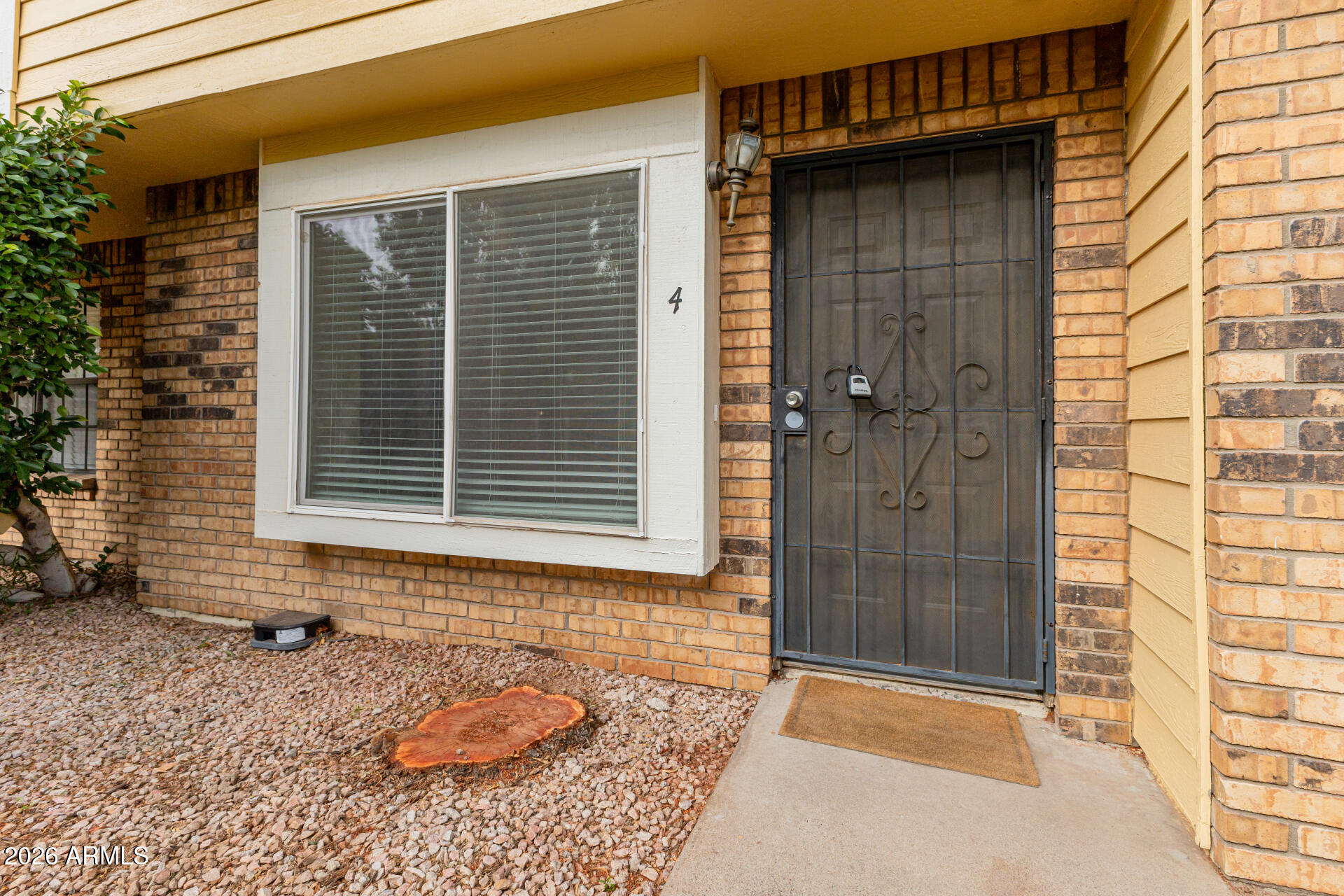 4843 East Corral Road, Unit 4 Phoenix, AZ 85044 - Photo 2 of 36 a view of a door and a window