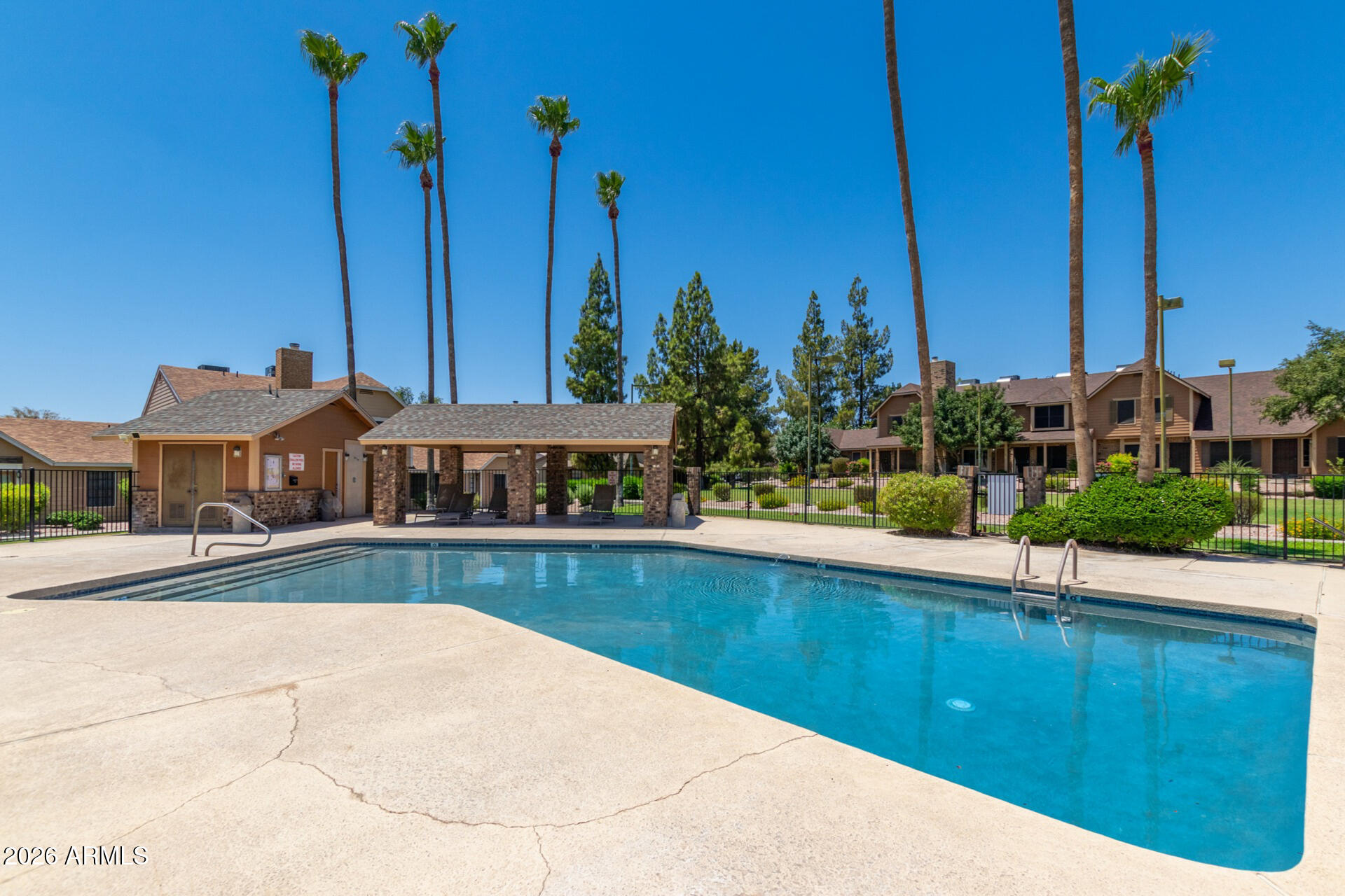 4843 East Corral Road, Unit 4 Phoenix, AZ 85044 - Photo 32 of 36 a view of a house with a swimming pool