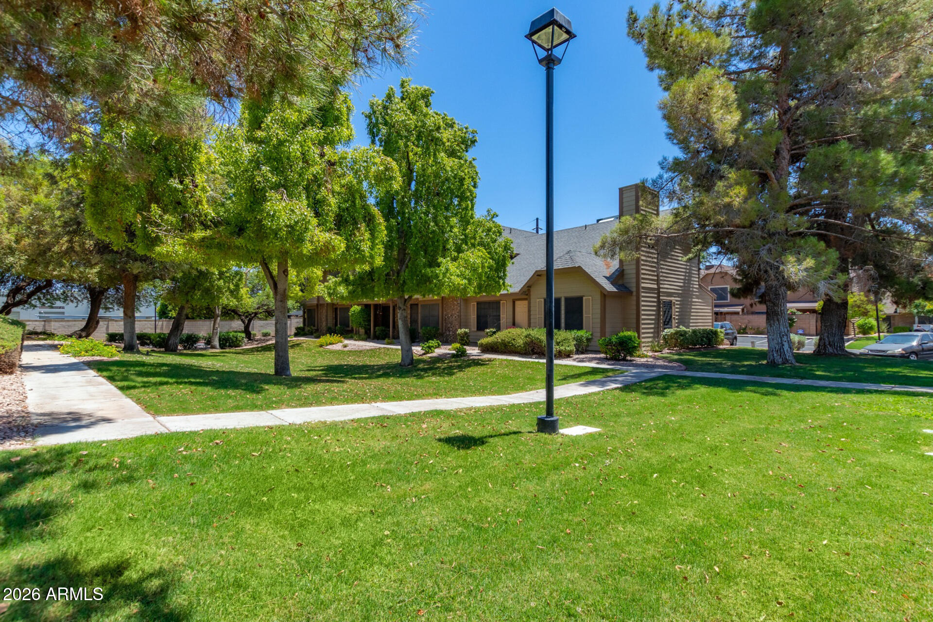 4843 East Corral Road, Unit 4 Phoenix, AZ 85044 - Photo 34 of 36 a view of a park with large trees