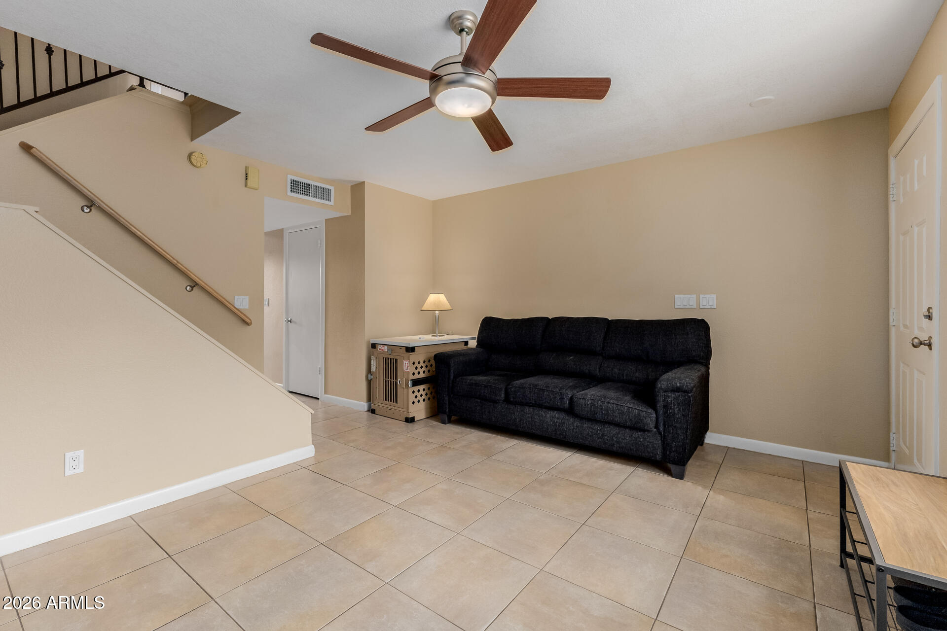 4843 East Corral Road, Unit 4 Phoenix, AZ 85044 - Photo 6 of 36 a living room with furniture and a ceiling fan