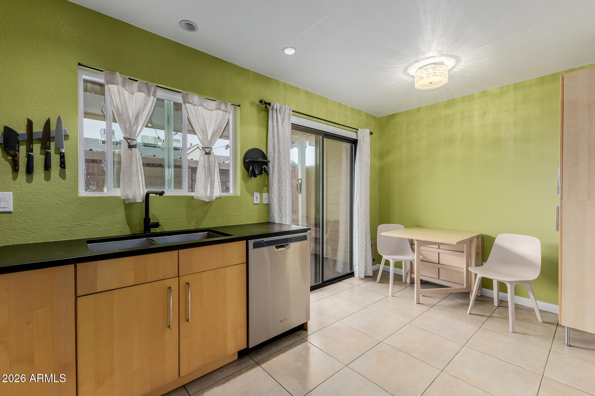 4843 East Corral Road, Unit 4 Phoenix, AZ 85044 - Photo 8 of 36 a bathroom with a sink and a mirror