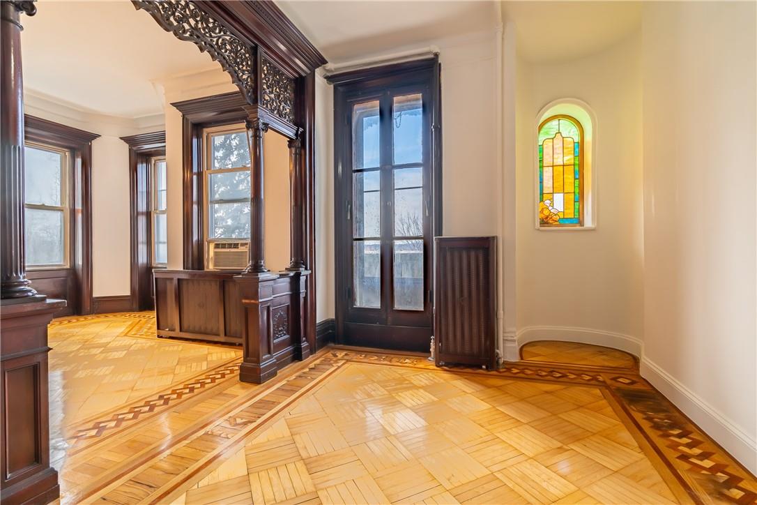 2744 Kingsbridge Terrace Bronx, NY 10463 - Photo 6 of 36 Unit 2 living room with fireplace & stained glass