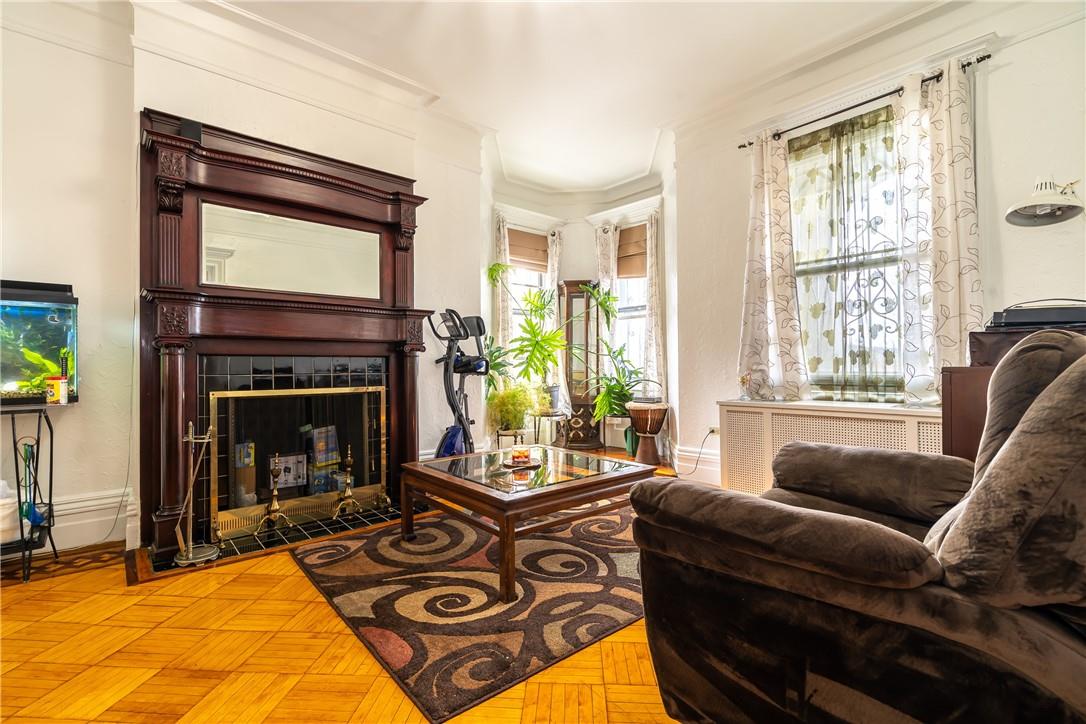 2744 Kingsbridge Terrace Bronx, NY 10463 - Photo 9 of 36 Unit 1 Living room with fireplace