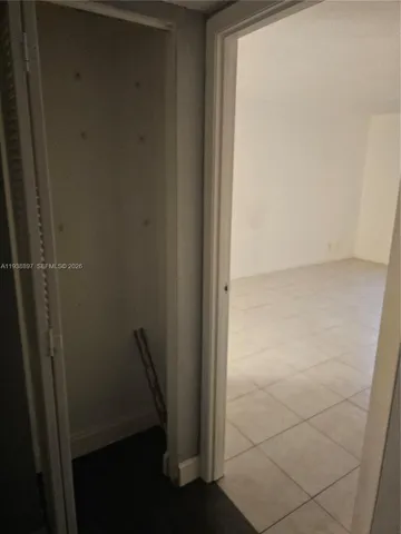 a bathroom with a tub and a shower